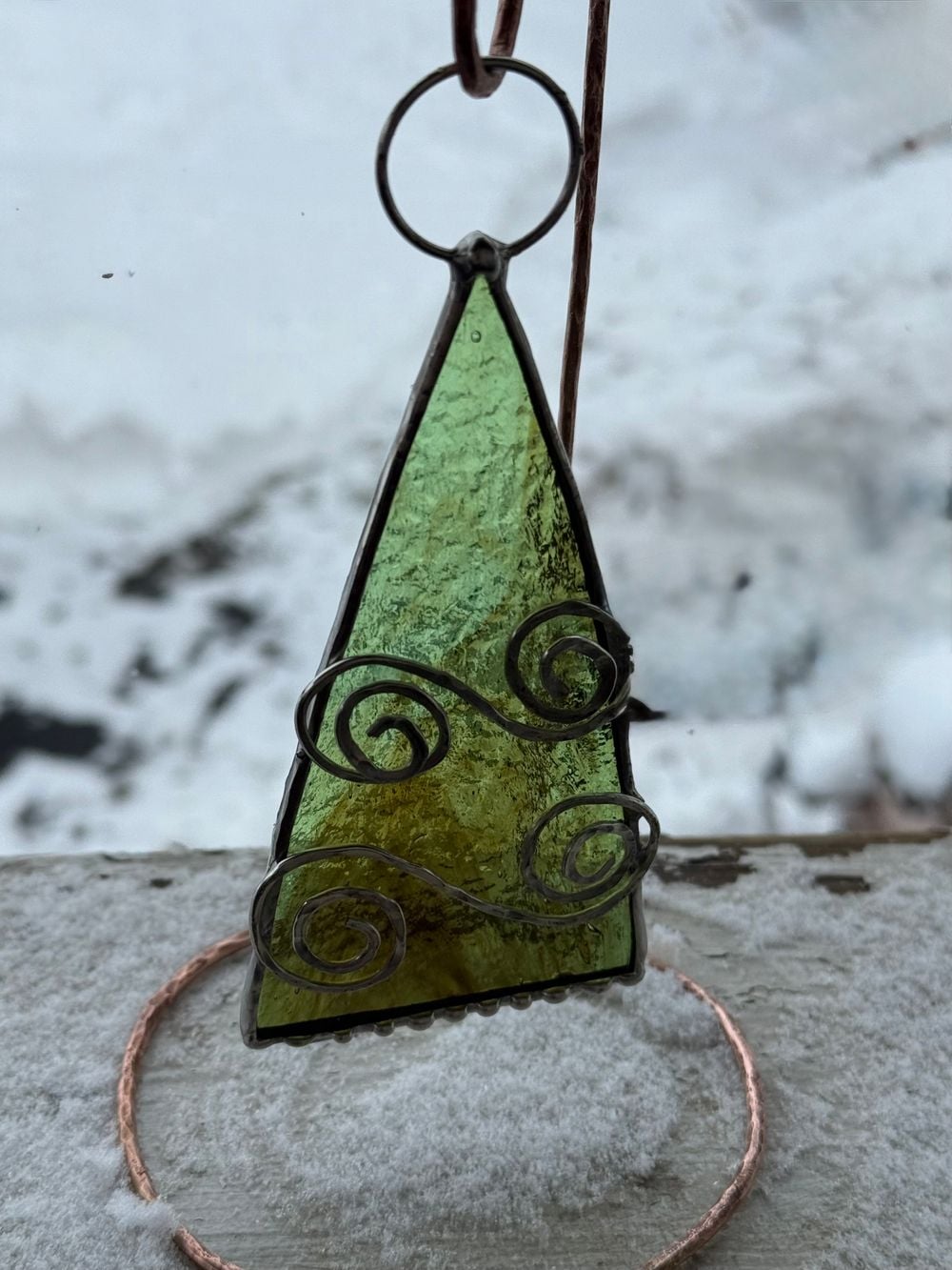 Hanging ornament and copper stand are not connected.